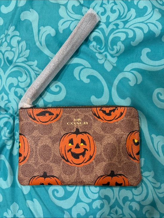 Coach Handbags - Coach Halloween signature wristlet with Jack o lanterns